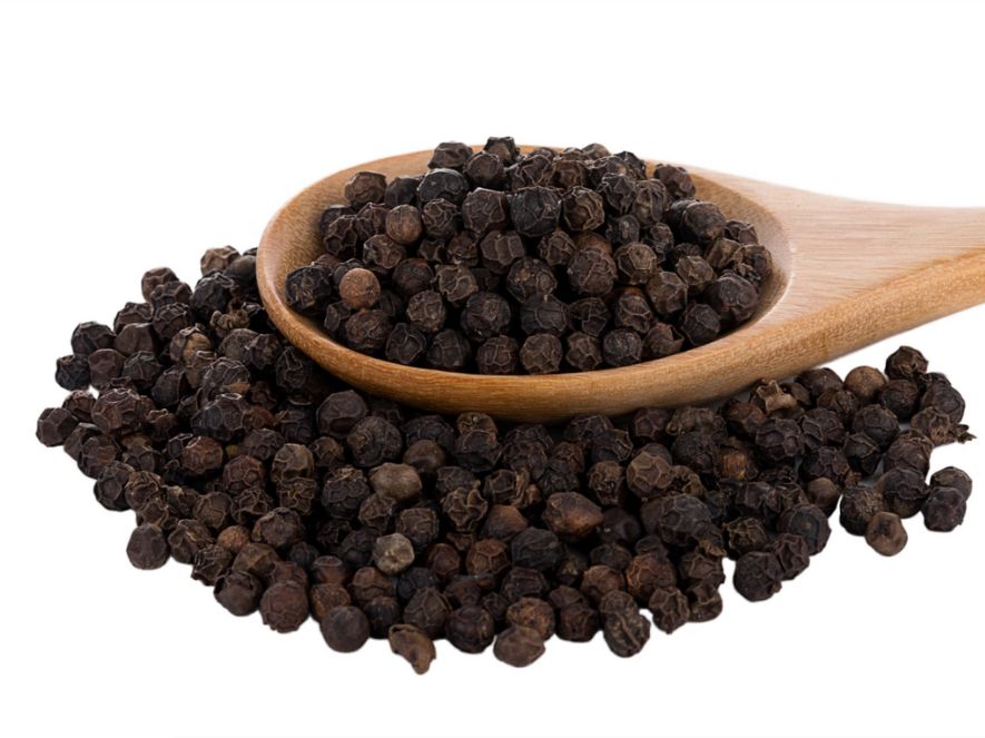 black pepper on white background